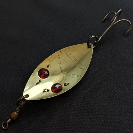 Hofschneider Red Eye Wiggler, mosiądz/czerwone oczy, 25 g błystka wahadłowa #20666