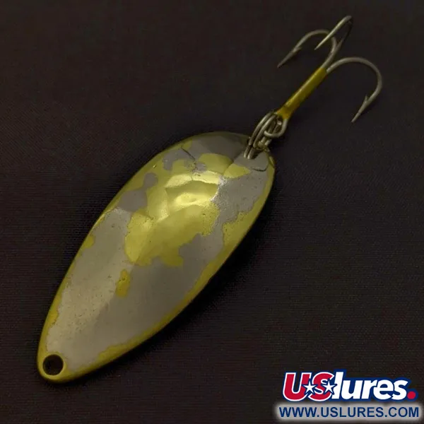 Seneca Little Cleo (Hula Girl), nikiel/złoto, 14 g błystka wahadłowa #24365