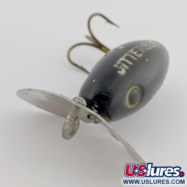 Arbogast Jitterbug Wobler powierzchniowy, Czarny, 4 g, Metalowy ster, #24507