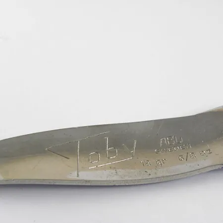 Abu Garcia Abu Toby, nikiel/niebieski, 18 g błystka wahadłowa #0961