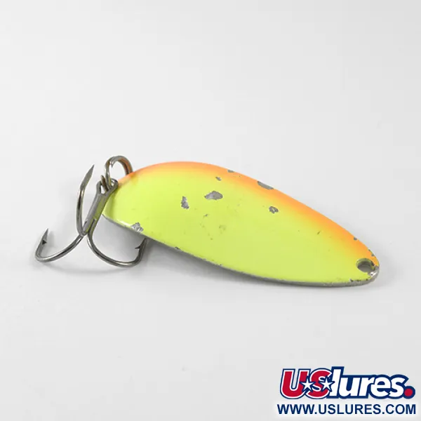 Seneca Little Cleo (Hula Girl), pomarańczowy/żółty/nikiel, 14 g błystka wahadłowa #1574