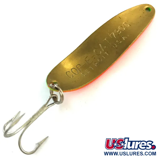 Eppinger Dardevle Cop-E-Cat 7300 UV (świeci w ultrafiolecie), Ognisty Tygrys (Fire Tiger)/mosiądz. Fire Tiger UV - świeci w ultrafiolecie, 10 g błystka wahadłowa #15717