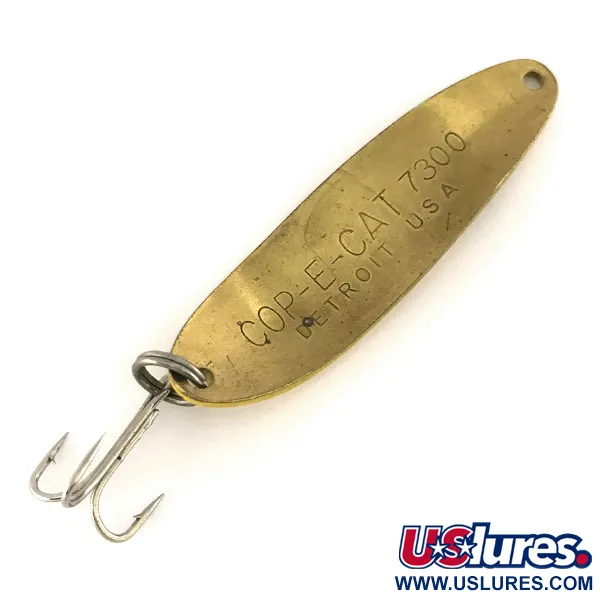 Eppinger Dardevle Cop-E-Cat 7300, Piątka Diamentów (żółty/czarny/mosiądz), 10 g błystka wahadłowa #7524